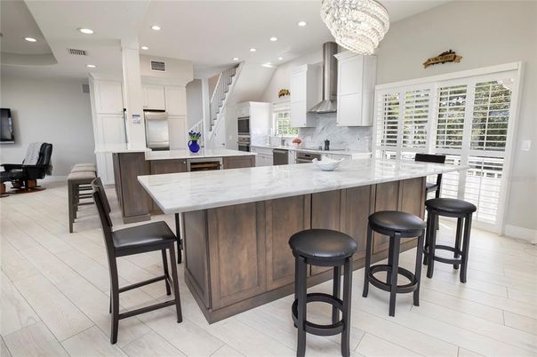 Chandelier, Interior, Kitchen, Recessed Lighting, Stainless Steel Appliances, Wood Texture Flooring