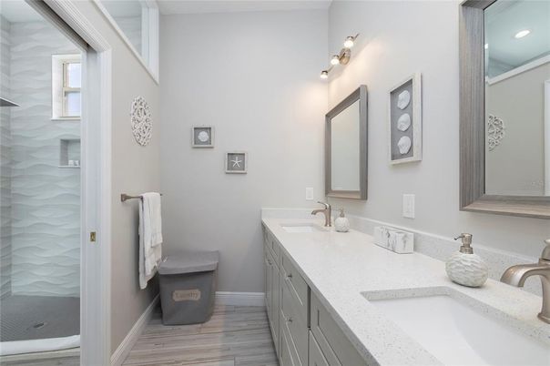 Bathroom, Dual Sink Vanities, Interior, Recessed Lighting, Wood Texture Flooring