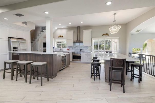 Chandelier, Interior, Kitchen, Recessed Lighting, Stainless Steel Appliances, Wood Texture Flooring
