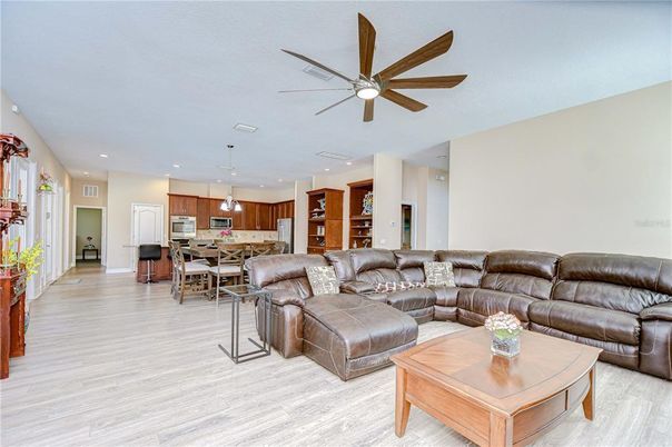 Dining room, Interior, Kitchen, Living room, Pendant Lights, Recessed Lighting, Stainless Steel Appliances, Wood Texture Flooring