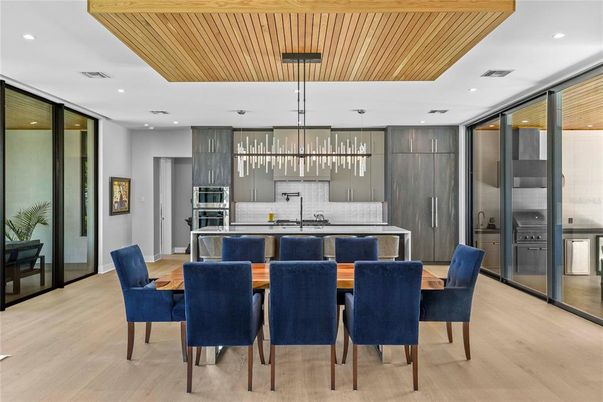 Dining room, Interior, Kitchen, Pendant Lights, Recessed Lighting, Stainless Steel Appliances, Wooden Ceilings, Wood Texture Flooring