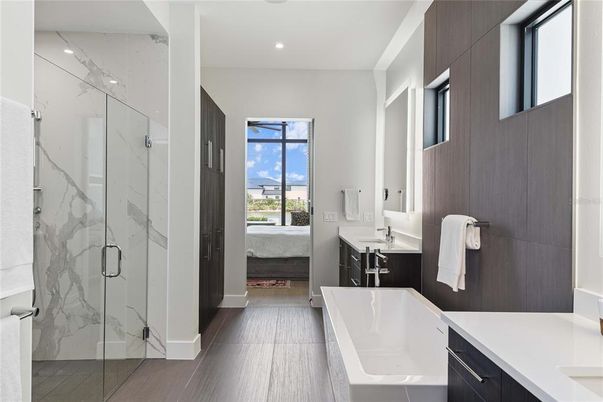 Bathroom, Glass Shower, Interior, Marble Walls, Recessed Lighting, Wood Texture Flooring