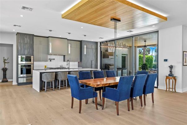 Dining room, Interior, Kitchen, Pendant Lights, Recessed Lighting, Stainless Steel Appliances, Wooden Ceilings, Wood Texture Flooring