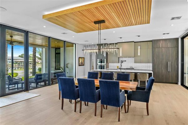 Dining room, Interior, Kitchen, Pendant Lights, Recessed Lighting, Stainless Steel Appliances, Wooden Ceilings, Wood Texture Flooring