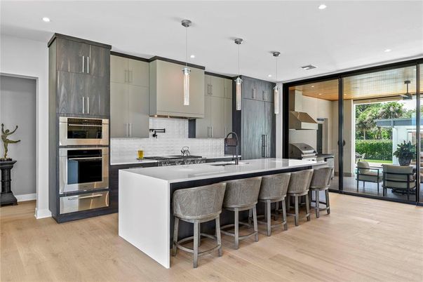 Interior, Kitchen, Pendant Lights, Recessed Lighting, Stainless Steel Appliances, Wood Texture Flooring