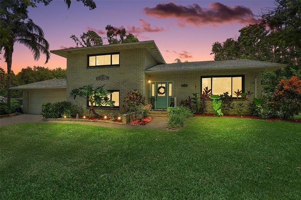 Attached, Backyard, Exterior, Facade, Brick Facade, Split Level