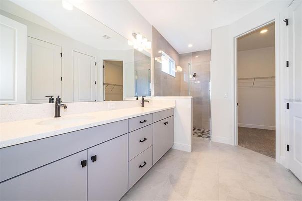 Bathroom, Dual Sink Vanities, Glass Shower, Interior, Recessed Lighting, Walk-in Closets