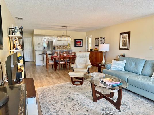 Dining room, Interior, Kitchen, Living room, Pendant Lights, Stainless Steel Appliances, Wood Texture Flooring