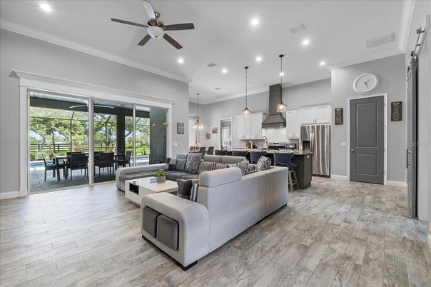 Dining room, Interior, Kitchen, Living room, Pendant Lights, Recessed Lighting, Stainless Steel Appliances, Wood Texture Flooring