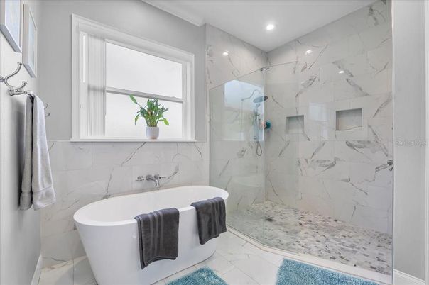Bathroom, Free Standing Baths, Glass Shower, Interior, Marble, Marble Walls, Recessed Lighting