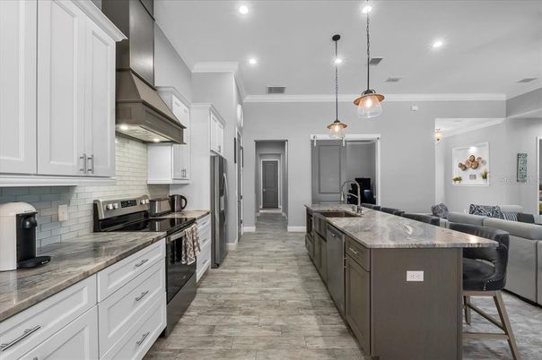 Interior, Kitchen, Pendant Lights, Recessed Lighting, Stainless Steel Appliances, Wood Texture Flooring