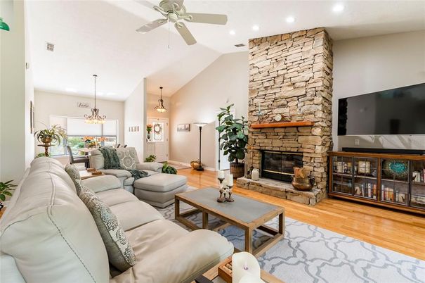 Dining room, Fireplace, Interior, Living room, Pendant Lights, Recessed Lighting, Stone Walls, Wood Texture Flooring