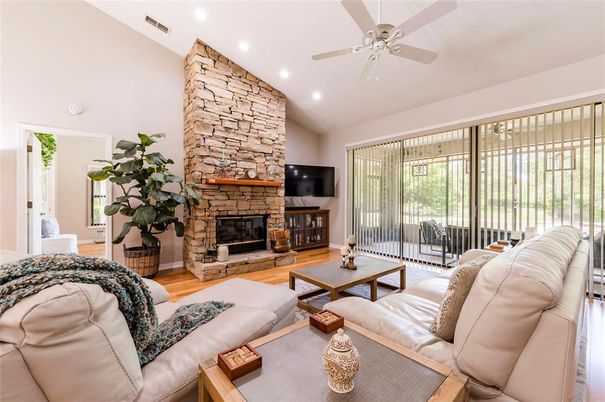 Fireplace, Interior, Living room, Recessed Lighting, Stone Walls, Wood Texture Flooring