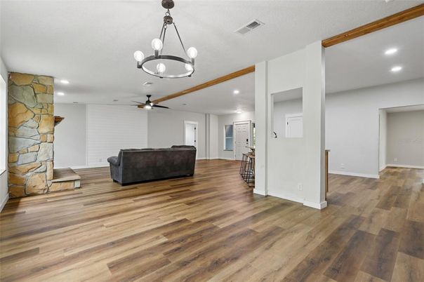 Empty room, Interior, Pendant Lights, Recessed Lighting, Stone Walls, Wooden Beams, Wood Texture Flooring