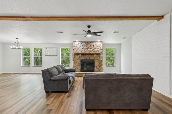Fireplace, Interior, Living room, Pendant Lights, Stone Walls, Wooden Beams, Wood Texture Flooring