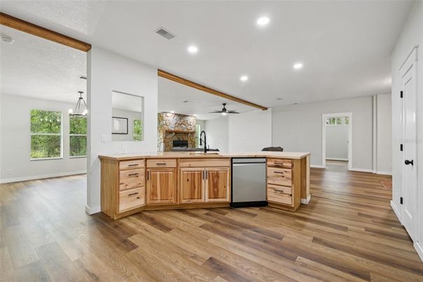 Fireplace, Interior, Kitchen, Pendant Lights, Recessed Lighting, Wood Texture Flooring