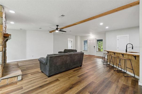 Fireplace, Interior, Living room, Recessed Lighting, Wood Texture Flooring
