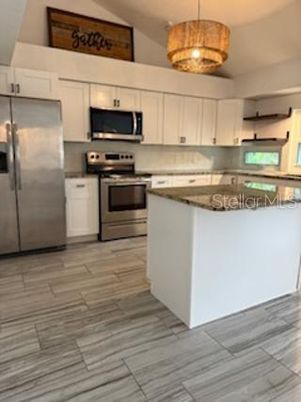 Chandelier, Interior, Kitchen, Pendant Lights, Stainless Steel Appliances, Wood Texture Flooring