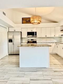 Chandelier, Interior, Kitchen, Pendant Lights, Stainless Steel Appliances, Wood Texture Flooring