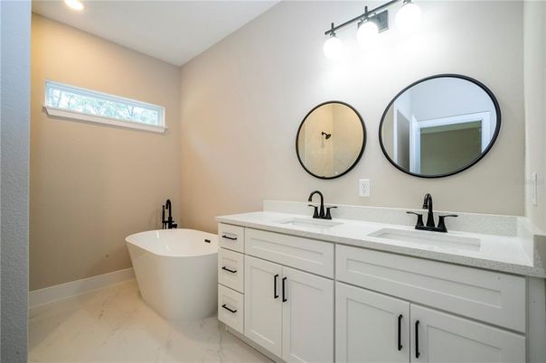 Bathroom, Dual Sink Vanities, Free Standing Baths, Interior, Marble, Recessed Lighting