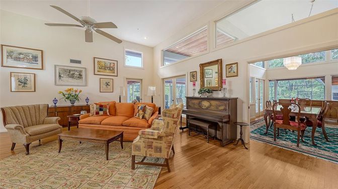 Chandelier, Dining room, Interior, Living room, Piano, Recessed Lighting, Wood Texture Flooring