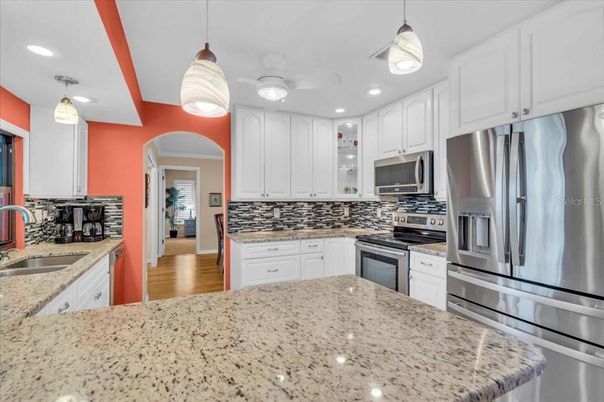Interior, Kitchen, Pendant Lights, Recessed Lighting, Stainless Steel Appliances, Wood Texture Flooring