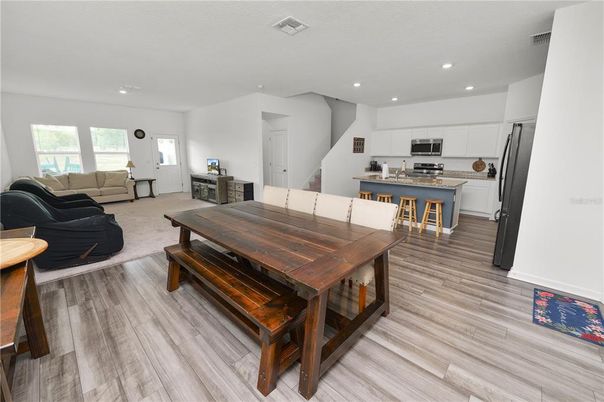 Dining room, Interior, Kitchen, Living room, Recessed Lighting, Stainless Steel Appliances, Wood Texture Flooring