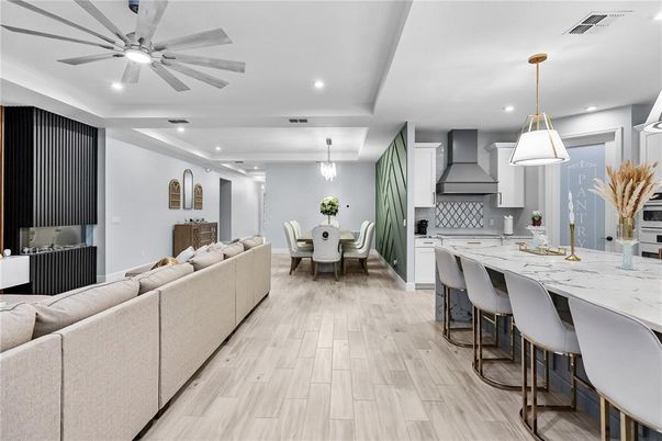 Dining room, Interior, Kitchen, Living room, Pendant Lights, Recessed Lighting, Stainless Steel Appliances, Wood Texture Flooring