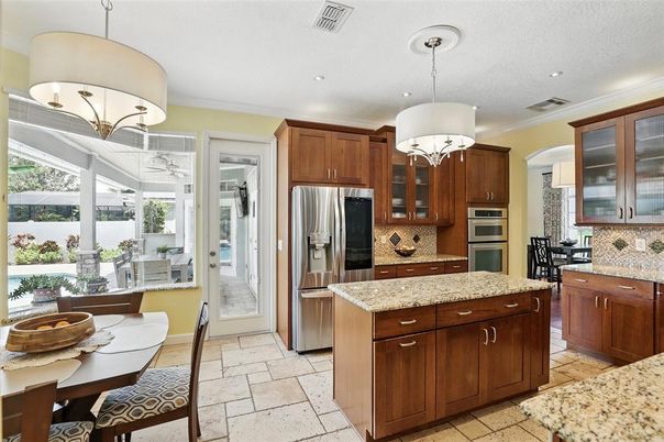 Chandelier, Dining room, Interior, Kitchen, Pendant Lights, Recessed Lighting, Stainless Steel Appliances