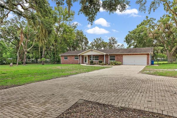 Attached, Backyard, Exterior, Facade, Brick Facade, Ranch