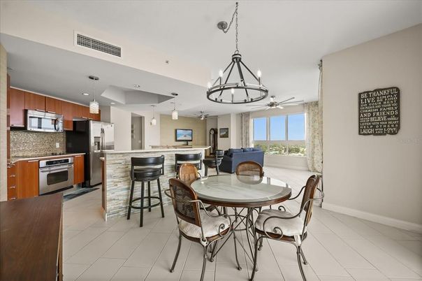 Chandelier, Dining room, Interior, Kitchen, Pendant Lights, Recessed Lighting, Stainless Steel Appliances