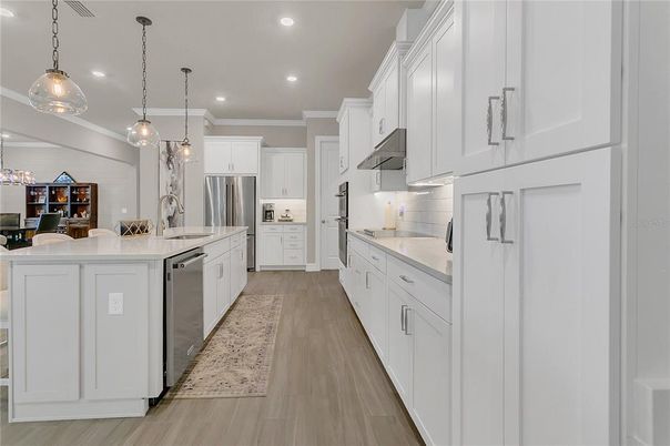 Interior, Kitchen, Pendant Lights, Recessed Lighting, Stainless Steel Appliances, Wood Texture Flooring