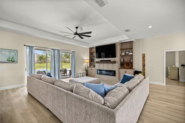 Fireplace, Interior, Living room, Recessed Lighting, Wood Texture Flooring