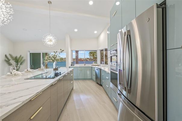Interior, Kitchen, Pendant Lights, Recessed Lighting, Stainless Steel Appliances, Water, Wood Texture Flooring