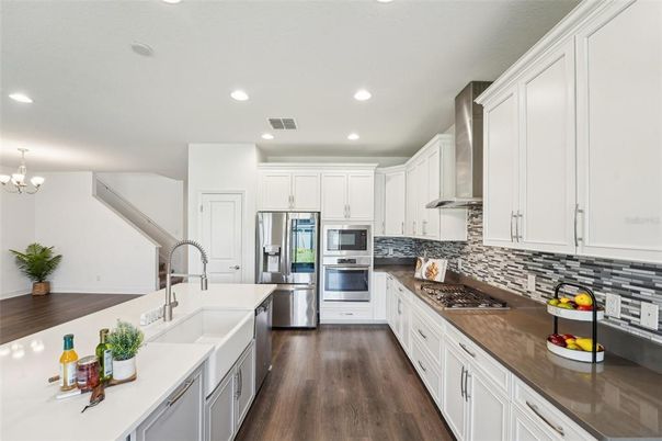 Chandelier, Interior, Kitchen, Recessed Lighting, Stainless Steel Appliances, Wood Texture Flooring