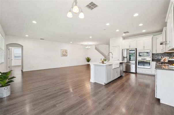 Chandelier, Interior, Kitchen, Recessed Lighting, Stainless Steel Appliances, Wood Texture Flooring