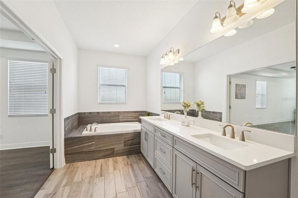 Bathroom, Dual Sink Vanities, Interior, Recessed Lighting, Wood Texture Flooring