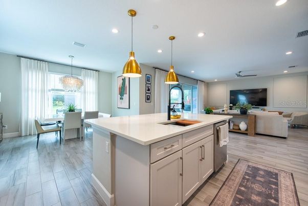 Dining room, Interior, Kitchen, Living room, Pendant Lights, Recessed Lighting, Stainless Steel Appliances, Wood Texture Flooring