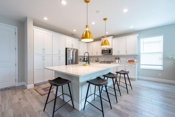 Interior, Kitchen, Pendant Lights, Recessed Lighting, Stainless Steel Appliances, Wood Texture Flooring