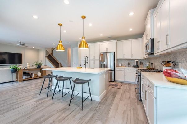 Interior, Kitchen, Pendant Lights, Recessed Lighting, Stainless Steel Appliances, Wood Texture Flooring