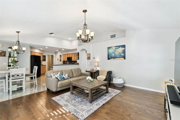 Chandelier, Dining room, Interior, Kitchen, Living room, Pendant Lights, Recessed Lighting, Wood Texture Flooring