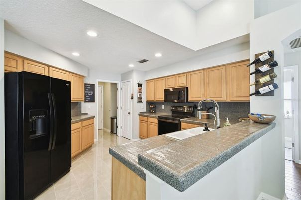 Interior, Kitchen, Recessed Lighting, Tile Countertops
