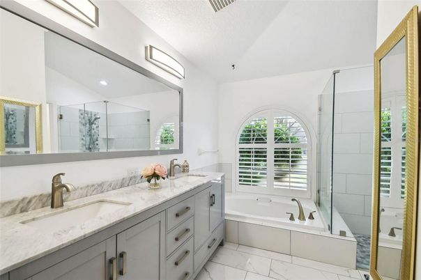 Bathroom, Dual Sink Vanities, Glass Shower, Interior, Marble, Recessed Lighting