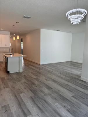 Empty room, Interior, Kitchen, Pendant Lights, Recessed Lighting, Wood Texture Flooring