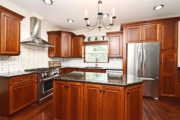 Chandelier, Interior, Kitchen, Recessed Lighting, Stainless Steel Appliances, Wood Texture Flooring