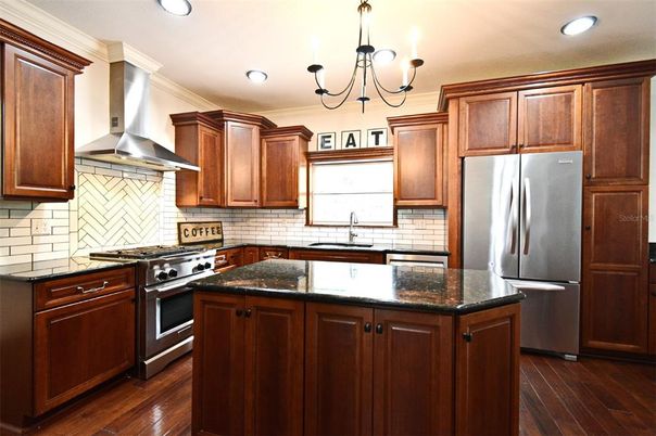 Chandelier, Interior, Kitchen, Recessed Lighting, Stainless Steel Appliances, Wood Texture Flooring