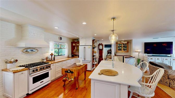Dining room, Interior, Kitchen, Pendant Lights, Recessed Lighting, Stainless Steel Appliances, Wood Texture Flooring