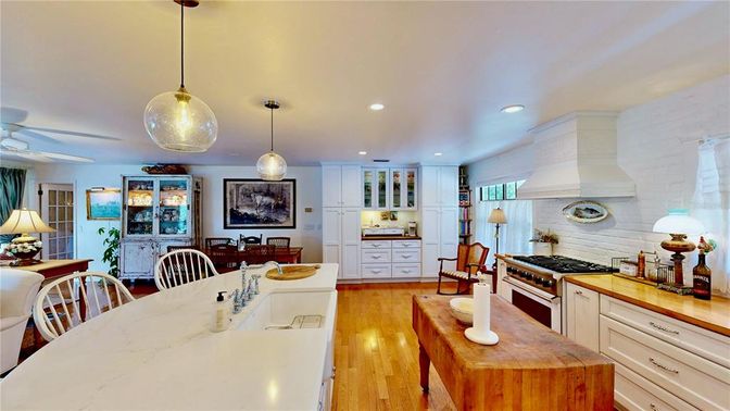 Dining room, Interior, Kitchen, Pendant Lights, Recessed Lighting, Stainless Steel Appliances, Wood Texture Flooring