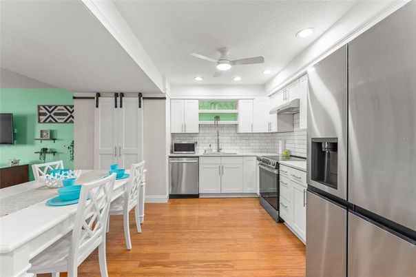 Interior, Kitchen, Recessed Lighting, Stainless Steel Appliances, Wood Texture Flooring