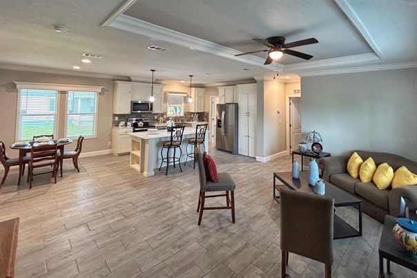 Dining room, Interior, Kitchen, Pendant Lights, Recessed Lighting, Stainless Steel Appliances, Wood Texture Flooring